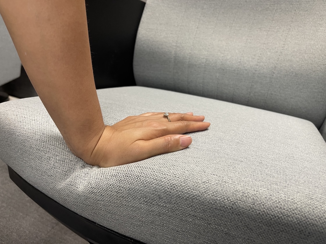 High resilience foam compression test on auditorium chair seat cushion